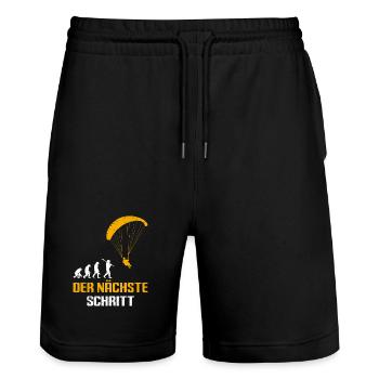 Paraglider Geschenk DER NÄCHSTE SCHRITT - Stanley/Stella Unisex Bio Joggingshorts Trainer  - Schwarz - Vorne - Nik (191cm) & Marisol (170cm)