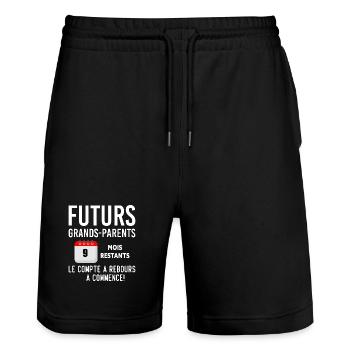 Futurs Grands Parents Cadeau Annonce de Grossesse - Short de jogging bio TRAINER Stanley/Stella unisexe - noir - Devant - Nik (191cm) & Marisol (170cm)