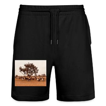 Goats under a tree in the savannah - Stanley/Stella Trainer Unisex Organic Jogging Shorts - black - Front - Nik (191cm) & Marisol (170cm)