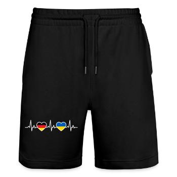 Ukraine Deutschland Herzschlag Flagge Ukrainer - Stanley/Stella Unisex Bio Joggingshorts Trainer  - Schwarz - Vorne - Nik (191cm) & Marisol (170cm)