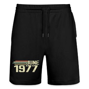 Juin 1977 Anniversaire Juin 1977 Juin 1977 Anniversaire - Short de jogging bio TRAINER Stanley/Stella unisexe - noir - Devant - Nik (191cm) & Marisol (170cm)
