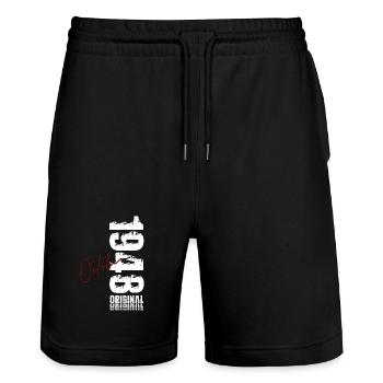 77th Birthday Original October 1948 - Stanley/Stella Trainer Unisex Organic Jogging Shorts - black - Front - Nik (191cm) & Marisol (170cm)