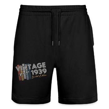 85th Birthday Vintage November 1939 Vintage 1939 - Stanley/Stella Trainer Unisex Organic Jogging Shorts - black - Front - Nik (191cm) & Marisol (170cm)