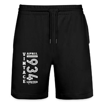 90e anniversaire mari Original avril Vintage 1934 - Short de jogging bio TRAINER Stanley/Stella unisexe - noir - Devant - Nik (191cm) & Marisol (170cm)
