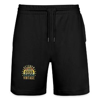 Die Legenden wurden im Oktober 2022 - 2022 geboren - Stanley/Stella Unisex Bio Joggingshorts Trainer  - Schwarz - Vorne - Nik (191cm) & Marisol (170cm)
