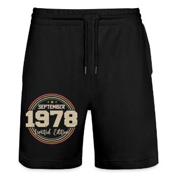 September 1978 Birthday Gift 1978 - Stanley/Stella Trainer Unisex Organic Jogging Shorts - black - Front - Nik (191cm) & Marisol (170cm)