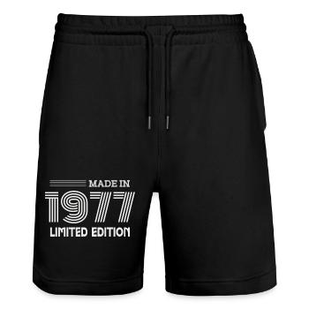 1977 Geburtstagsgeschenkidee 1977 - Stanley/Stella Unisex Bio Joggingshorts Trainer  - Schwarz - Vorne - Nik (191cm) & Marisol (170cm)