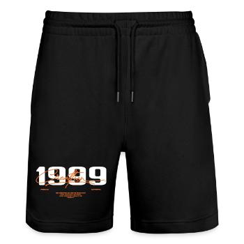 1999 Vintage Rétro 1999 Cadeau D'anniversaire 1999 - Short de jogging bio TRAINER Stanley/Stella unisexe - noir - Devant - Nik (191cm) & Marisol (170cm)