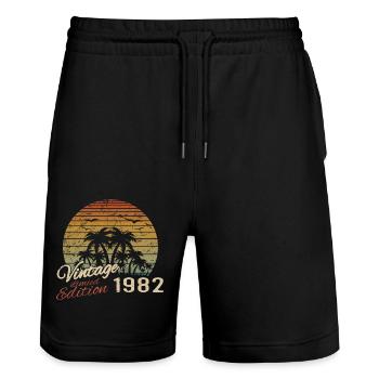 Vintage 1982 Geburtstagsgeschenk 1982 Retro 1982 - Stanley/Stella Unisex Bio Joggingshorts Trainer  - Schwarz - Vorne - Nik (191cm) & Marisol (170cm)
