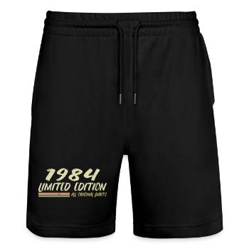 1984 Geburtstagsgeschenkidee 1984 - Stanley/Stella Unisex Bio Joggingshorts Trainer  - Schwarz - Vorne - Nik (191cm) & Marisol (170cm)