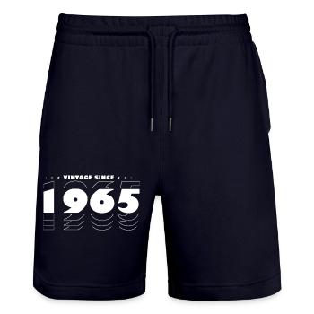 Proudly Celebrating 1965 - Vintage 60 Years of - Stanley/Stella Trainer Unisex Organic Jogging Shorts - dark navy - Front - Nik (191cm) & Marisol (170cm)