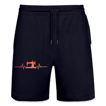 Nähmaschinen-Schneiderin von Sonnenuntergang - Stanley/Stella Unisex Bio Joggingshorts Trainer  - Dark navy - Vorne - Nik (191cm) & Marisol (170cm)