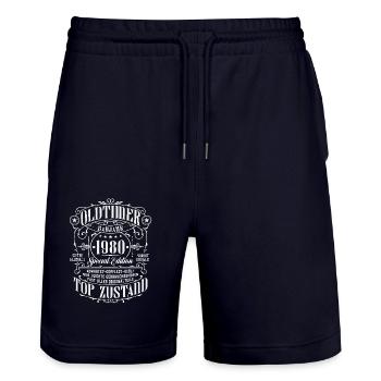 Oldtimer 1980 geboren Geburtstag Geschenk - Stanley/Stella Unisex Bio Joggingshorts Trainer  - Dark navy - Vorne - Nik (191cm) & Marisol (170cm)