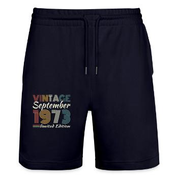 September 1973 Vintage Retro Birthday Gift - Stanley/Stella Trainer Unisex Organic Jogging Shorts - dark navy - Front - Nik (191cm) & Marisol (170cm)