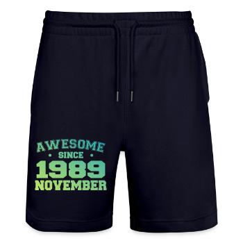 Geboren im November 1989, Geburtstagsgeschenk November 1989 - Stanley/Stella Unisex Bio Joggingshorts Trainer  - Dark navy - Vorne - Nik (191cm) & Marisol (170cm)