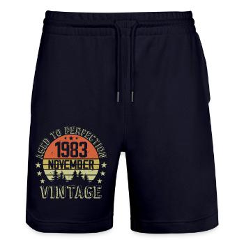 Birthday November 1983 Vintage November Gift - Stanley/Stella Trainer Unisex Organic Jogging Shorts - dark navy - Front - Nik (191cm) & Marisol (170cm)