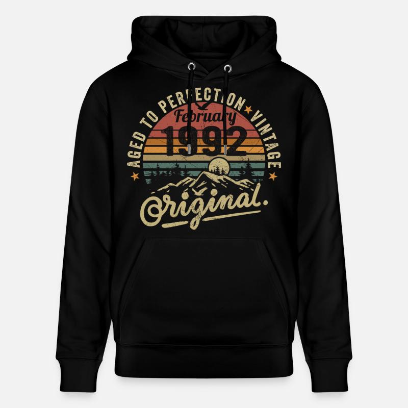 Février 1992 - Sweat à capuche bio CRUISER Stanley/Stella Unisexe - noir