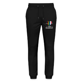 Afghanistan und Frankreich 100% Freundschaft - Stanley/Stella Unisex Bio Jogginghose Mover  - Schwarz - Vorne - Marisol (170cm) & Nik (191cm)