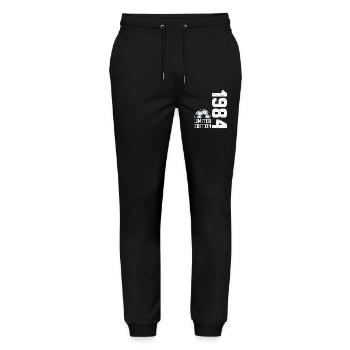 Fußball in limitierter Auflage zum 40-jährigen - Stanley/Stella Unisex Bio Jogginghose Mover  - Schwarz - Vorne - Marisol (170cm) & Nik (191cm)