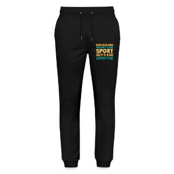 La motivation fitness : le bodybuilder n’est pas un sport - Pantalon de jogging bio MOVER Stanley/Stella unisexe - noir - Devant - Marisol (170cm) & Nik (191cm)