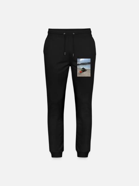 Ein Schuh am Rand mit einer Blume - Stanley/Stella Unisex Bio Jogginghose Mover  - Schwarz