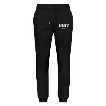 1987 Vintage Retro 1987 Geburtstagsgeschenk 1987 - Stanley/Stella Unisex Bio Jogginghose Mover  - Schwarz - Vorne - Marisol (170cm) & Nik (191cm)