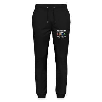 1984 - Born 1984 - Stanley/Stella Mover Unisex Organic Jogging Trousers - black - Front - Marisol (170cm) & Nik (191cm)