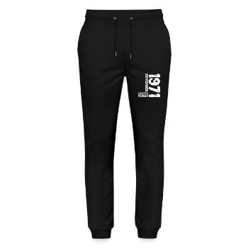 1971 November Limited Edition 52. Geburtstag Deko - Stanley/Stella Unisex Bio Jogginghose Mover  - Schwarz - Vorne - Marisol (170cm) & Nik (191cm)