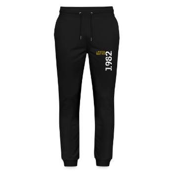 1982 Limited Edition Geburtstag Geschenk Frau Mann - Stanley/Stella Unisex Bio Jogginghose Mover  - Schwarz - Vorne - Marisol (170cm) & Nik (191cm)