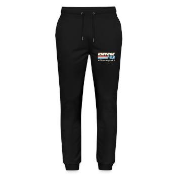 Célébrez un soixantenaire de légende avec humour - Pantalon de jogging bio MOVER Stanley/Stella unisexe - noir - Devant - Marisol (170cm) & Nik (191cm)