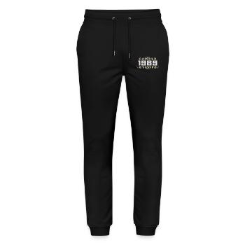 Jahrgang 1989 Retro Geburtstag 1989 Vintage 1989 - Stanley/Stella Unisex Bio Jogginghose Mover  - Schwarz - Vorne - Marisol (170cm) & Nik (191cm)