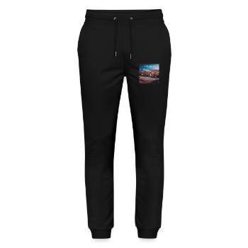 Aït-Ben-Haddou - Stanley/Stella Unisex Bio Jogginghose Mover  - Schwarz - Vorne - Marisol (170cm) & Nik (191cm)