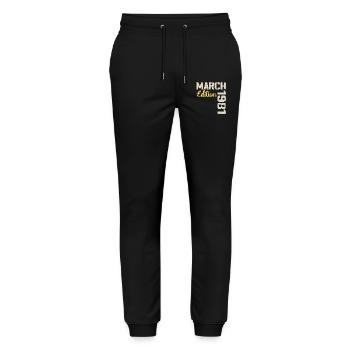 Mars 1981 Cadeau Anniversaire Mars 1981 - Pantalon de jogging bio MOVER Stanley/Stella unisexe - noir - Devant - Marisol (170cm) & Nik (191cm)