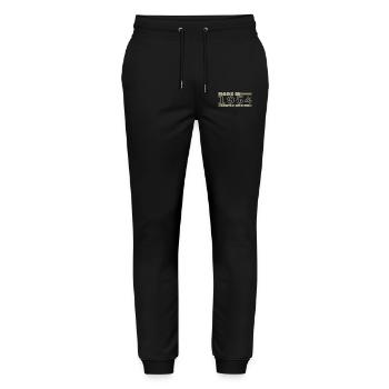 Vintage 1954 Born 1954 Birthday Gift Born in 1954 - Stanley/Stella Mover Unisex Organic Jogging Trousers - black - Front - Marisol (170cm) & Nik (191cm)