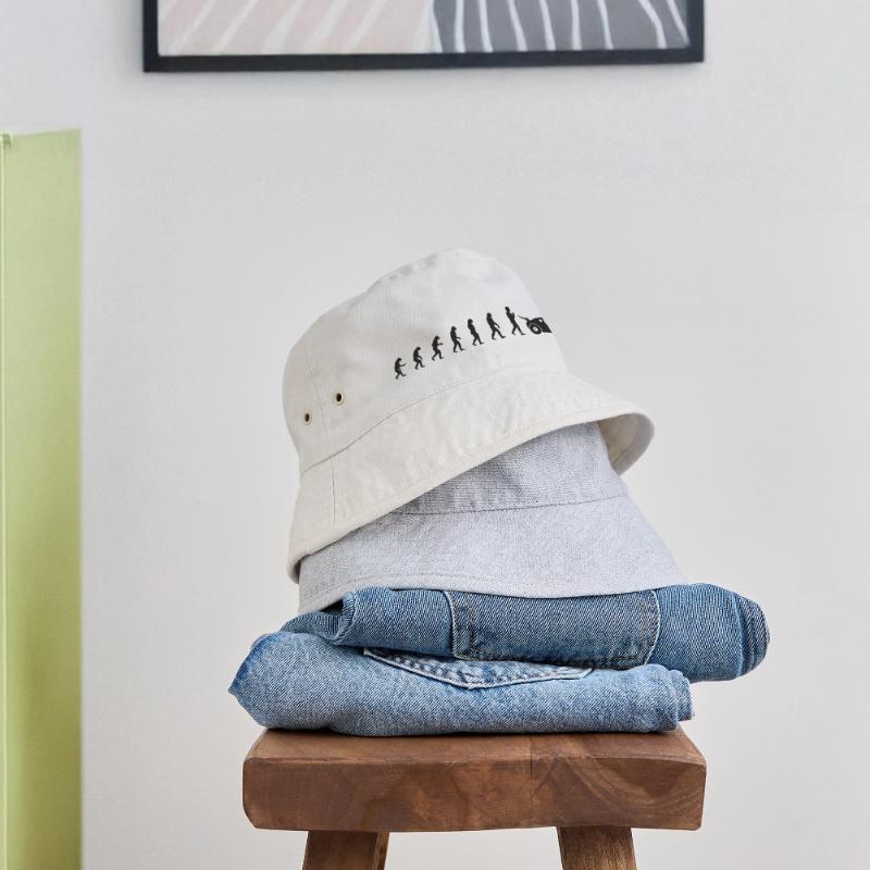 evolution of racing / Evolution Rennfahrer Design Stanley/Stella recycelter Bucket Hat