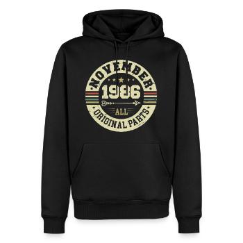 Millésime Novembre 1986 - Anniversaire Novembre 1986 - Sweat à capuche Premium bio Homme - noir - Devant - Nico (187cm)