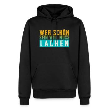 Schöner Spruch: Wer schön sein will, muss lachen! - Männer Premium Bio Hoodie - Schwarz - Vorne - Nico (187cm)