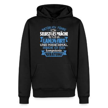 LANDWIRT - KOMPETENTE BERATUNG - Männer Premium Bio Hoodie - Schwarz - Vorne - Nico (187cm)
