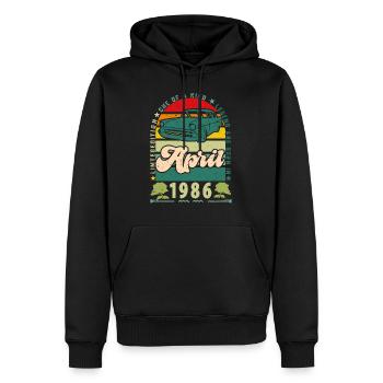 anniversaire avril 1986, Avril 1986, April 1986. - Sweat à capuche Premium bio Homme - noir - Devant - Nico (187cm)