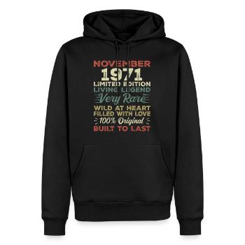 Légende : depuis novembre 1971 Né en novembre 1971 - Sweat à capuche Premium bio Homme - noir - Devant - Nico (187cm)