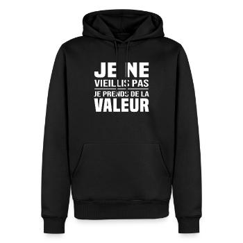 Je ne vieillis pas, je prends de la valeur - Sweat à capuche Premium bio Homme - noir - Devant - Nico (187cm)