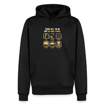 SKIING IN SPARE TIME - Men’s Premium Organic Hoodie - black - Front - Nico (187cm)