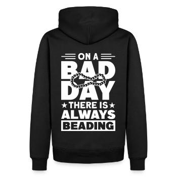 Perle Perle Broderie Bijoutier Fabricant de bijoux - Sweat à capuche Premium bio Homme - noir - Dos - Nico (187cm)
