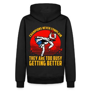 Champions never complain they are too busy getting - Men’s Premium Organic Hoodie - black - Back - Nico (187cm)