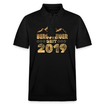 2019 - Stanley/Stella Unisex Organic Polo Shirt PREPSTER - black - Front - Roxy (174cm) & Andy (188cm)