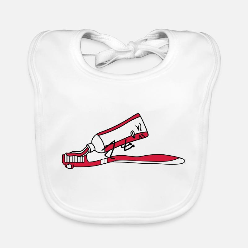 Brosse à dents merde merde comique face à un Bavoir bio Bébé