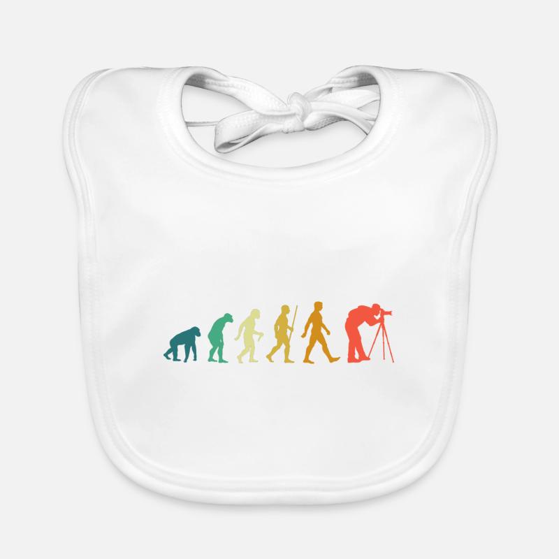 Photographie Évolution, photographe avec caméra objectif Bavoir bio Bébé