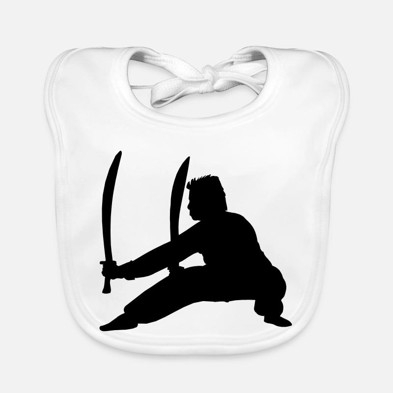 Pratiquant de Kung Fu avec deux épées Bavoir bio Bébé
