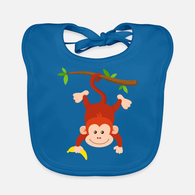 Monkey with banana hangs upside down on branch monkey design - Organic Baby Bibs - peacock-blue