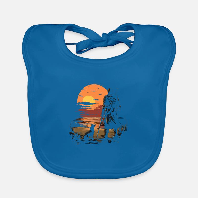 Evening walk on the beach with dog and Organic Baby Bibs